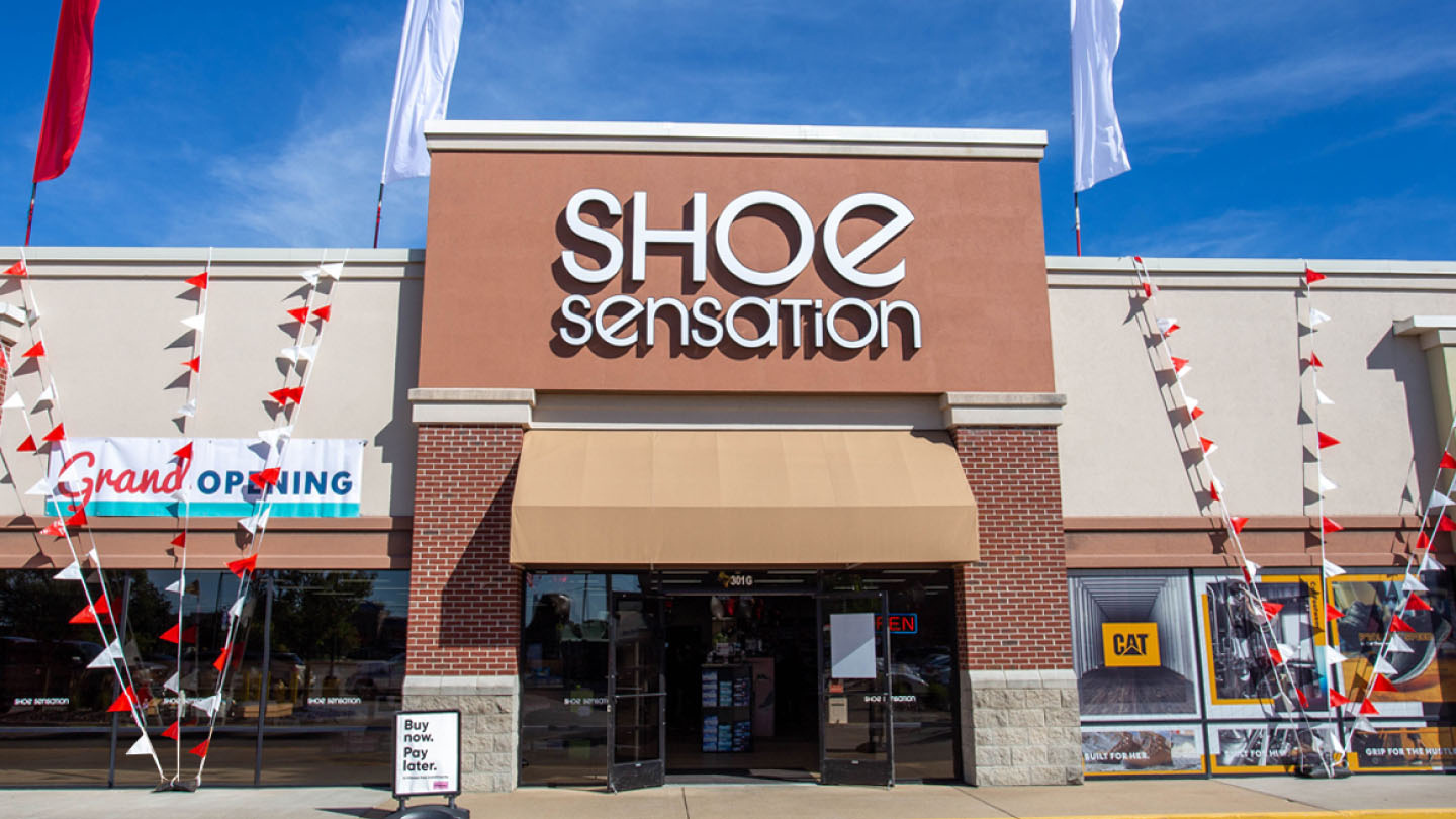 Big box store Shoe Sensation with grand opening banners